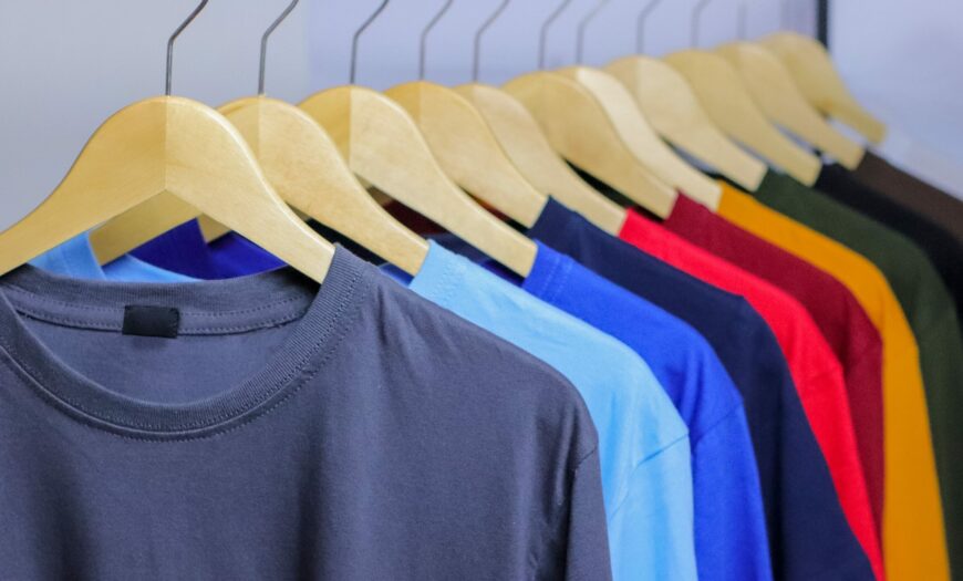 Colorful,T-shirts,On,Wooden,Hanger,Hanging,On,Clothing,Rack
