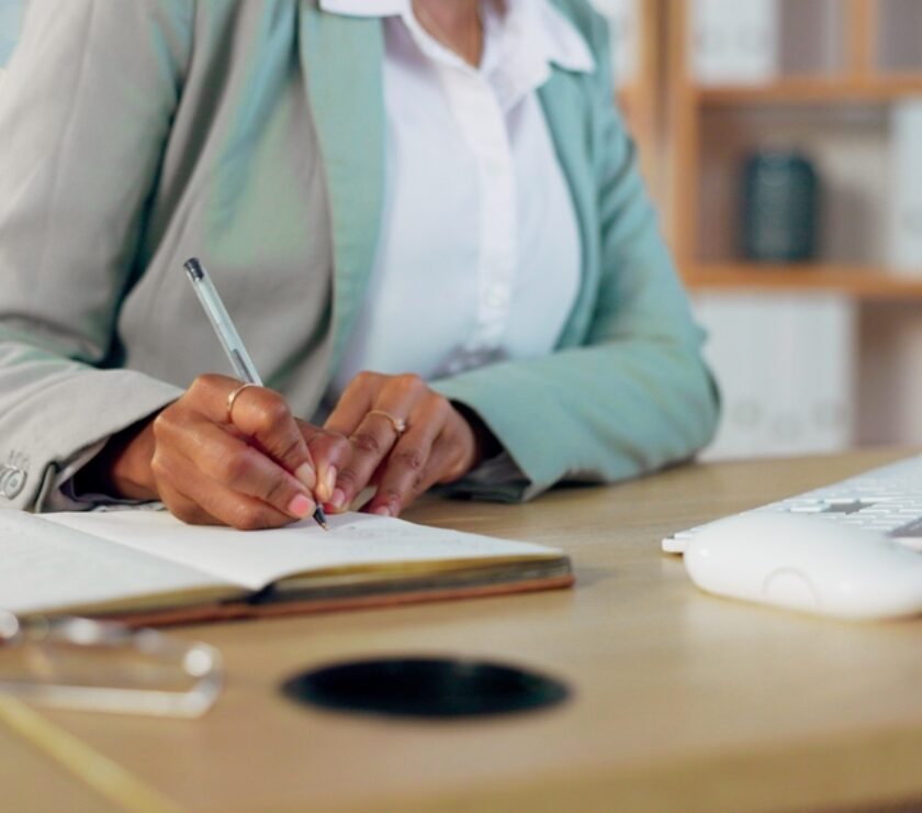 Person,Hands,,Writing,Schedule,In,Notebook,And,Planning,,Reminder,Or